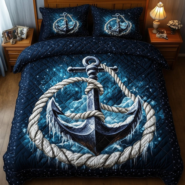 Blue Anchor quilted 3-piece bedding set on a made bed in a light coastal bedroom