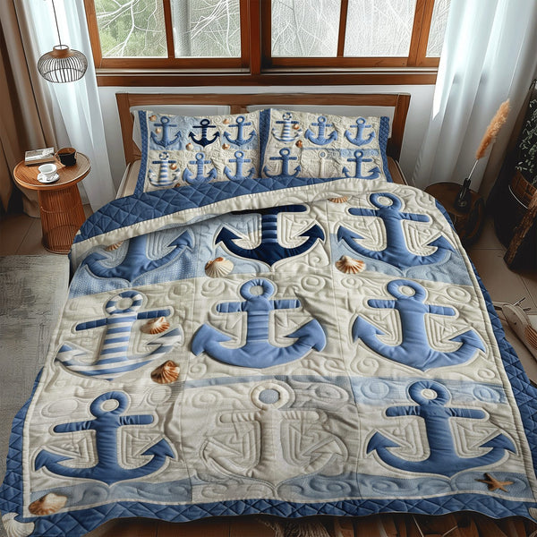 Blue Anchors quilted 3-piece bedding set on a made bed in a light coastal bedroom