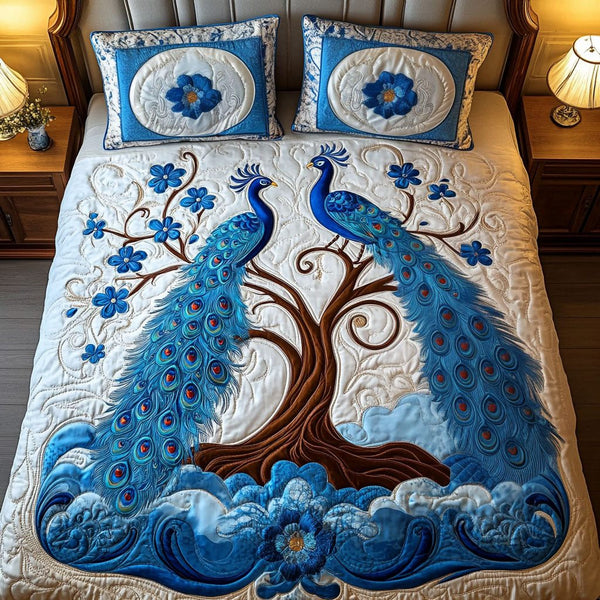 Blue Blossoms quilted 3-piece bedding set on a made bed with two matching pillow shams