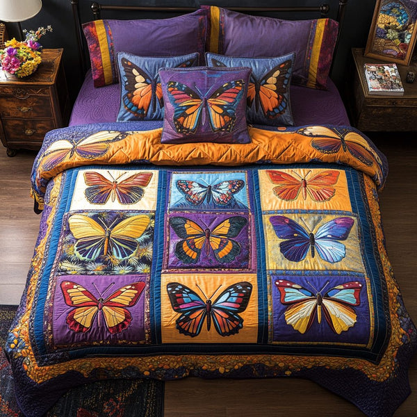 Blue Butterfly quilted 3-piece bedding set on a made bed with two matching pillow shams