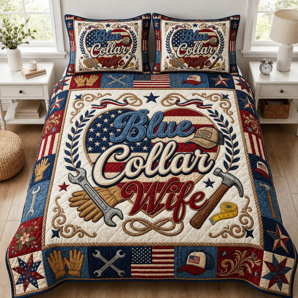 Blue Collar Wife quilted 3-piece bedding set on a made bed with two matching pillow shams