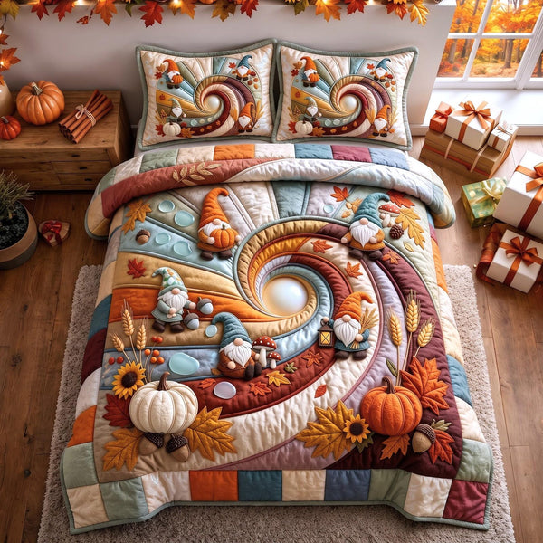 Blue Harvest quilted 3-piece bedding set on a made bed with two matching pillow shams