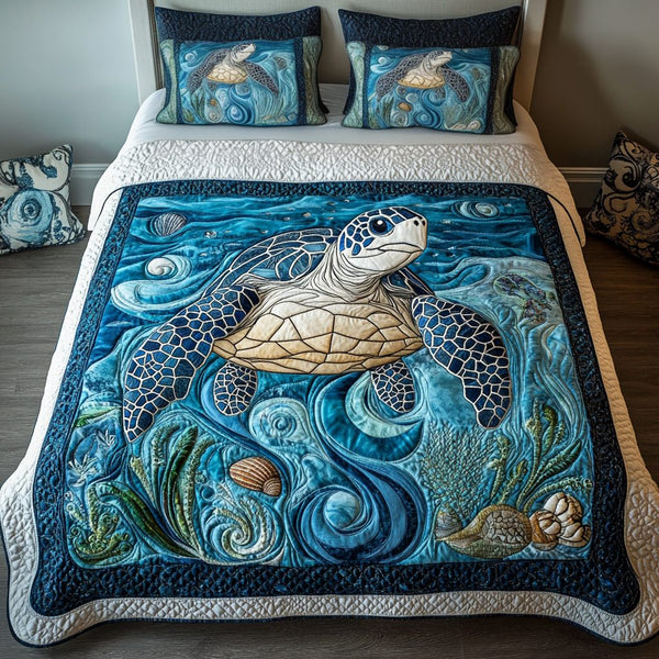 Blue Haven quilted 3-piece bedding set on a made bed with two matching pillow shams
