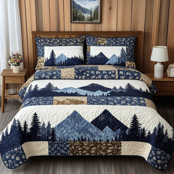 Blue Mountain quilted 3-piece bedding set on a made bed with two matching pillow shams