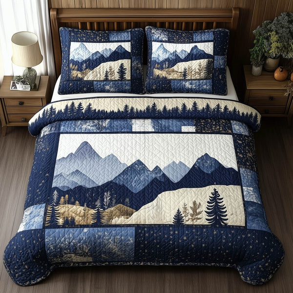 Blue Mountain quilted 3-piece bedding set on a made bed with two matching pillow shams