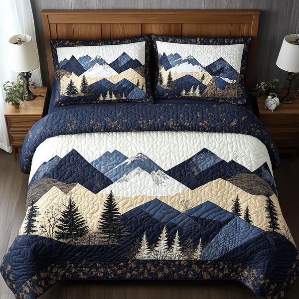 Blue Mountain quilted 3-piece bedding set on a made bed with two matching pillow shams