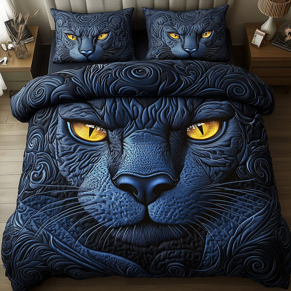 Blue Panther quilted 3-piece bedding set on a made bed with two matching pillow shams