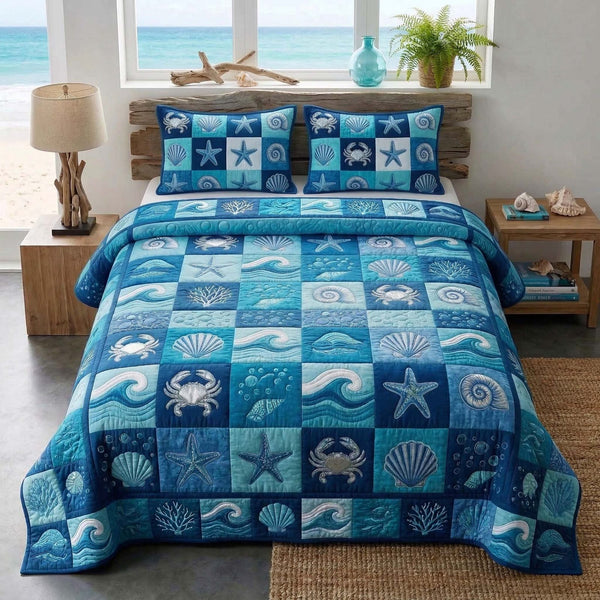 Blue Patchwork quilted 3-piece bedding set on a made bed in a farmhouse bedroom