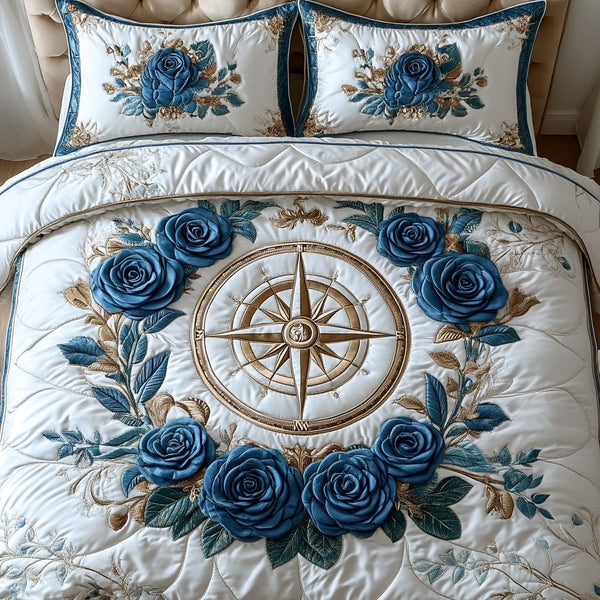 Blue Rose Charm quilted 3-piece bedding set on a made bed with two matching pillow shams