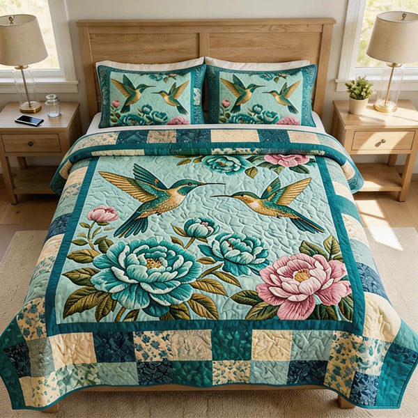 Blue Sanctuary quilted 3-piece bedding set on a made bed with two matching pillow shams