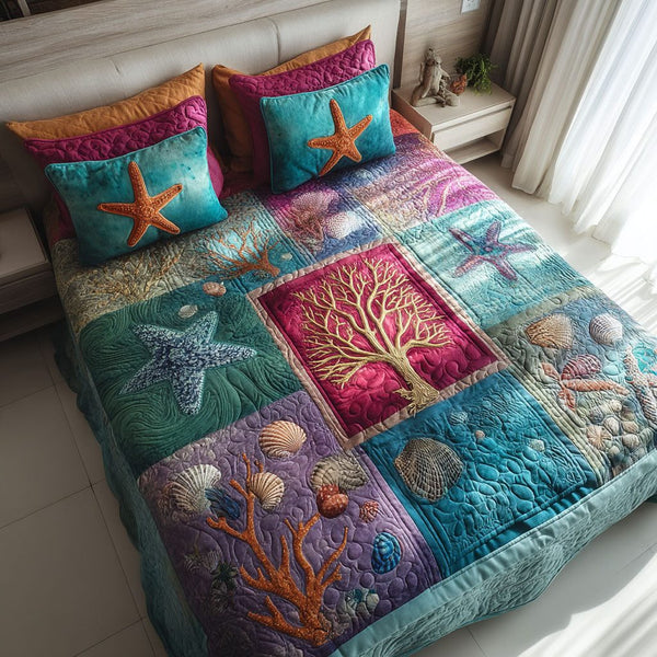 Blue Shore quilted 3-piece bedding set on a made bed in a light coastal bedroom
