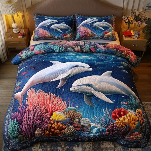 Blue Waves quilted 3-piece bedding set on a made bed in a light coastal bedroom
