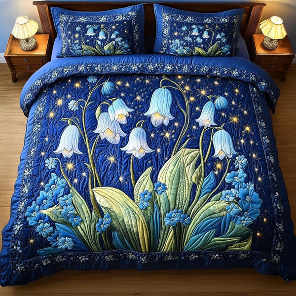 Bluebell Dream quilted 3-piece bedding set on a made bed with two matching pillow shams