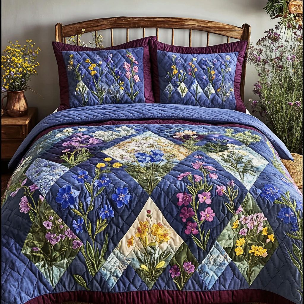 Bluebonnet Charm quilted 3-piece bedding set on a made bed with two matching pillow shams