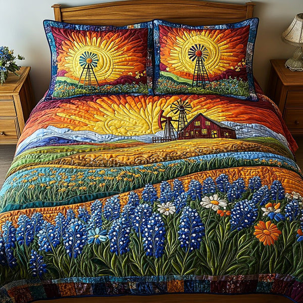 Bluebonnet Dreams quilted 3-piece bedding set on a made bed with two matching pillow shams
