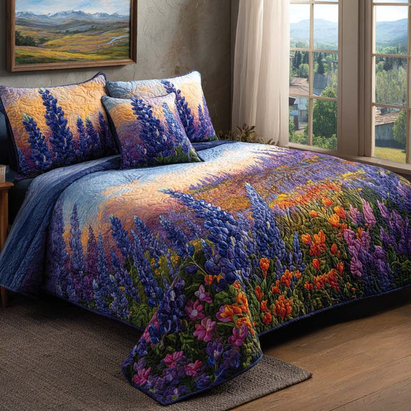 Bluebonnet Garden Sunset quilted 3-piece bedding set on a made bed with two matching pillow shams