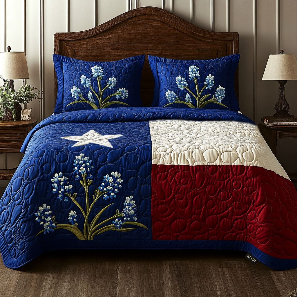 Bluebonnet quilted 3-piece bedding set on a made bed with two matching pillow shams