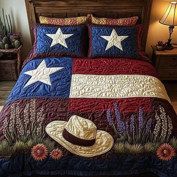 Bluebonnet State quilted 3-piece bedding set on a made bed with two matching pillow shams