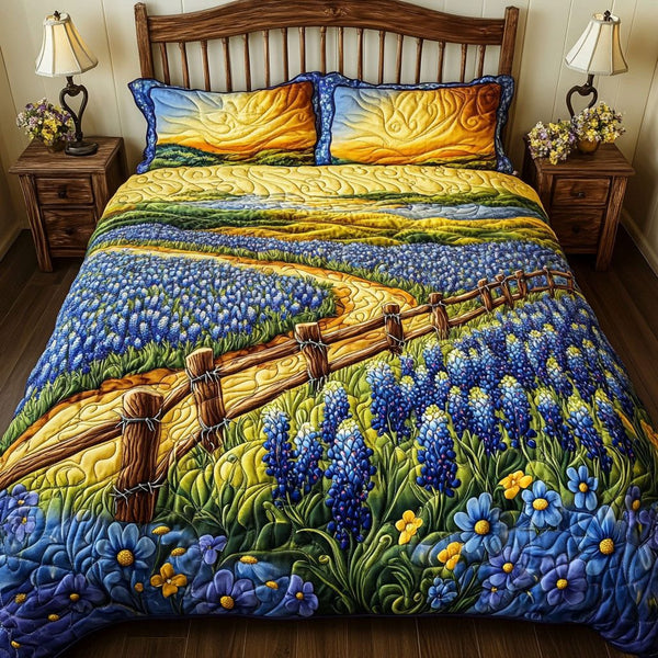 Bluebonnet Trail quilted 3-piece bedding set on a made bed with two matching pillow shams
