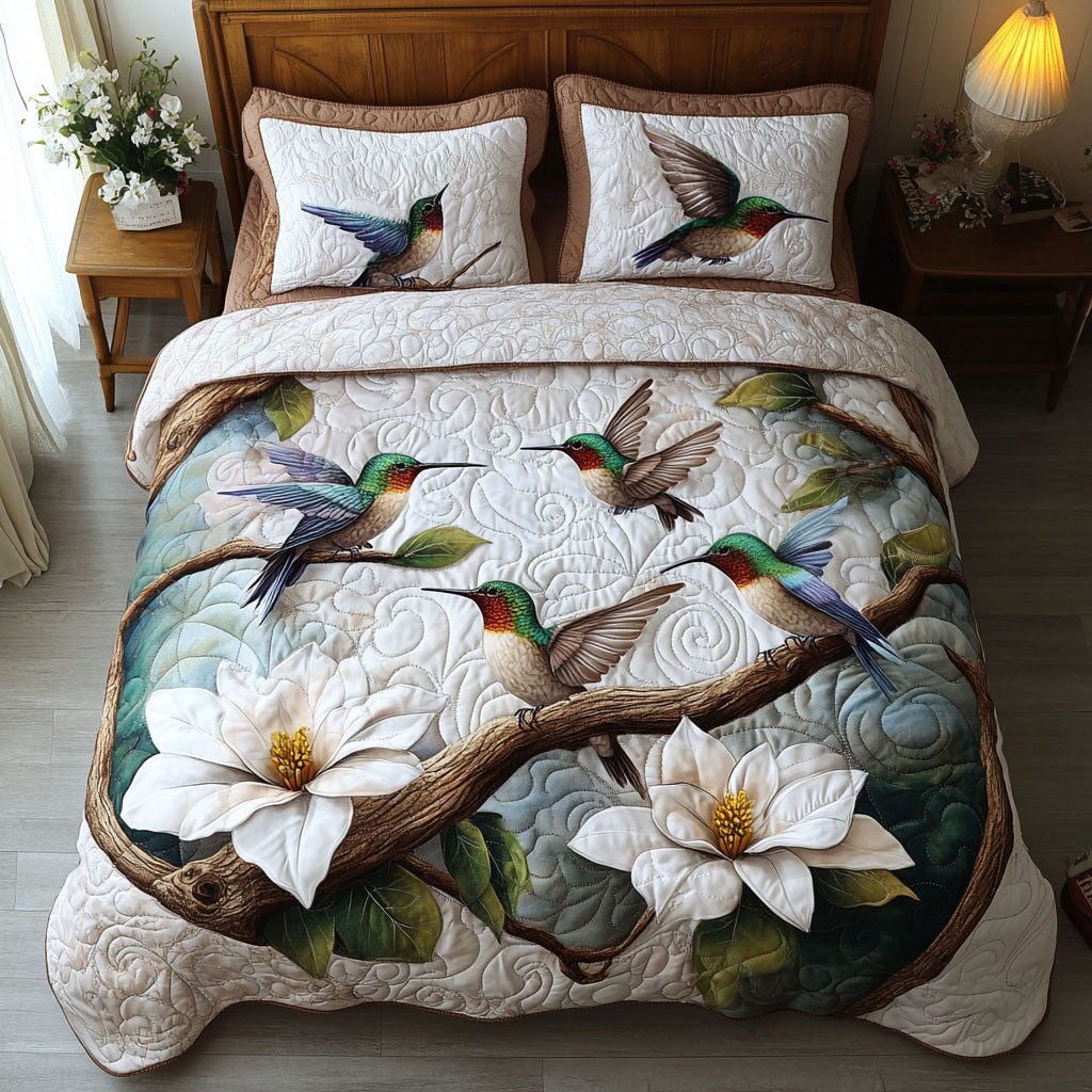 Blush Garden Melody quilted 3-piece bedding set on a made bed with two matching pillow shams