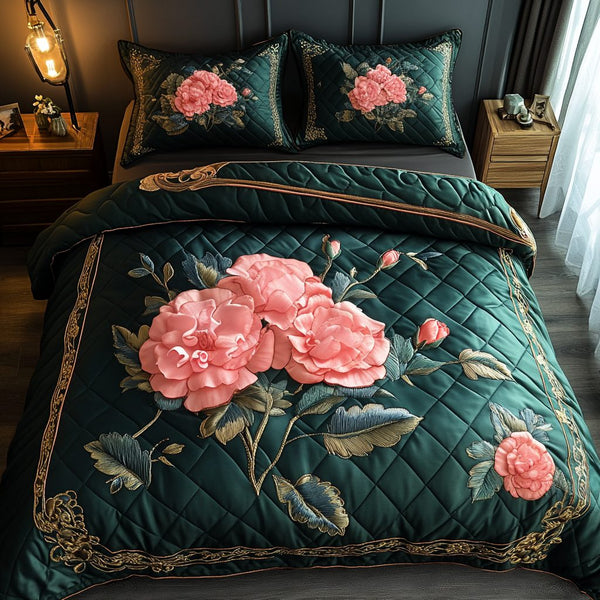 Blush Petals quilted 3-piece bedding set on a made bed with two matching pillow shams