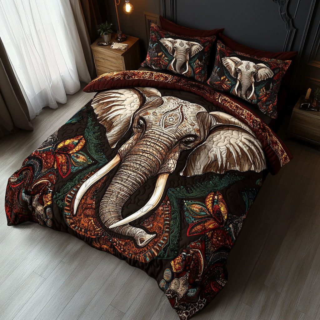 Bohemian Elephant Dreamscape quilted 3-piece bedding set on a made bed with two matching pillow shams