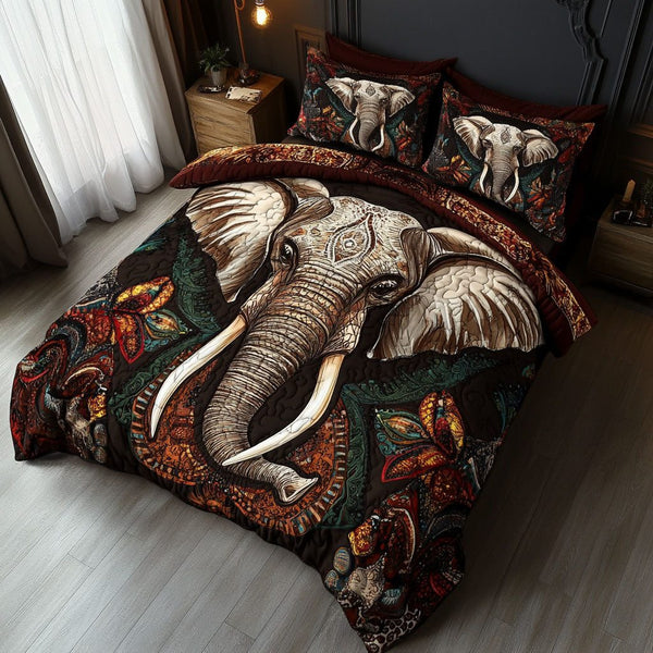 Bohemian Elephant Dreamscape quilted 3-piece bedding set on a made bed with two matching pillow shams