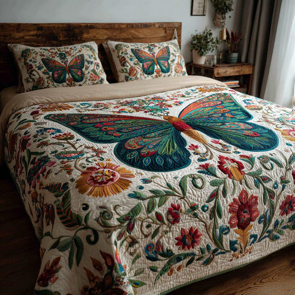 Boho Butterfly quilted 3-piece bedding set on a made bed with two matching pillow shams