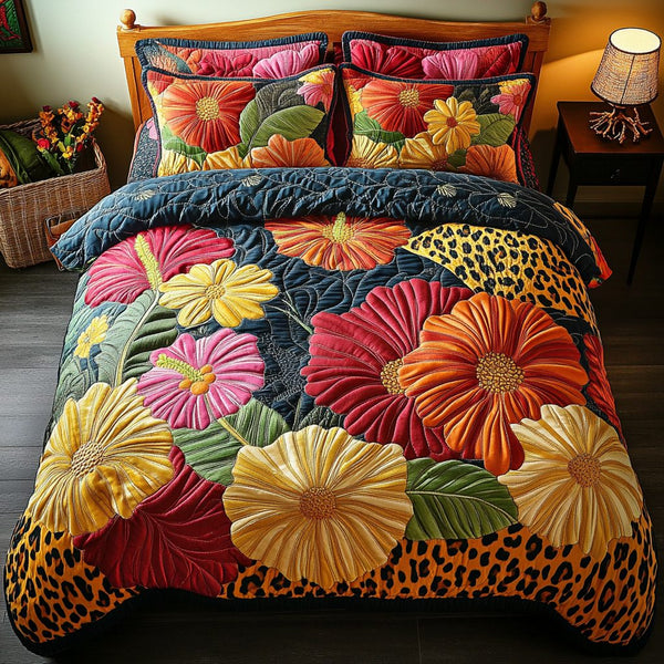 Bold Blossoms quilted 3-piece bedding set on a made bed with two matching pillow shams