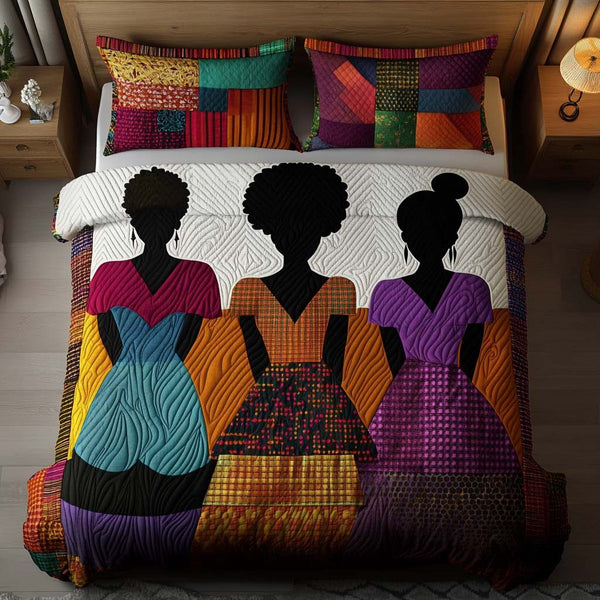 Bold Grace quilted 3-piece bedding set on a made bed with two matching pillow shams
