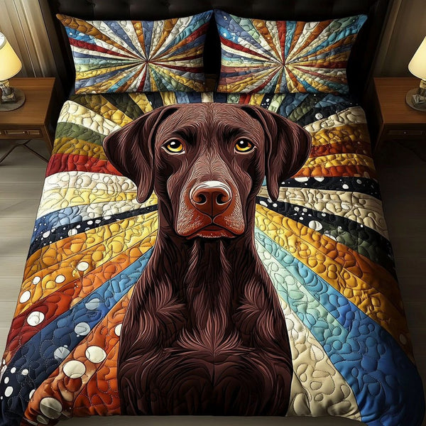 Bold GSP Portrait quilted 3-piece bedding set on a made bed with two matching pillow shams