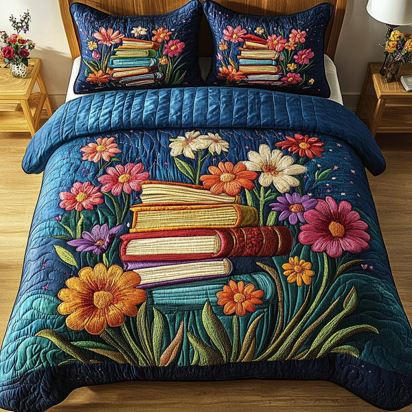 Book Bloom quilted 3-piece bedding set on a made bed with two matching pillow shams