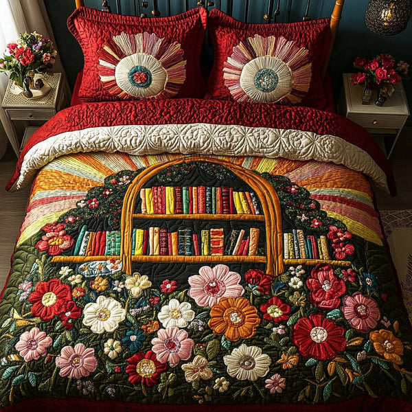Book Blossom quilted 3-piece bedding set on a made bed with two matching pillow shams