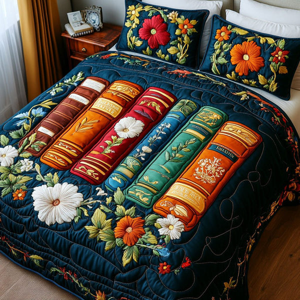 Book Lovers Dream quilted 3-piece bedding set on a made bed with two matching pillow shams