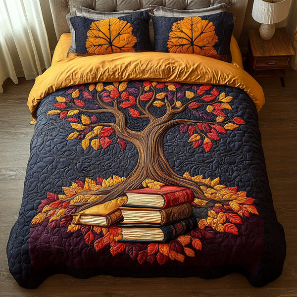 Book Tree quilted 3-piece bedding set on a made bed with two matching pillow shams