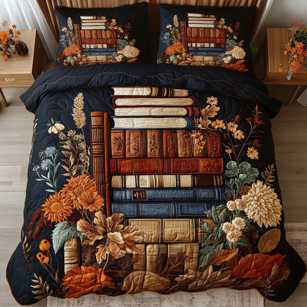 Bookish Bloom quilted 3-piece bedding set on a made bed with two matching pillow shams
