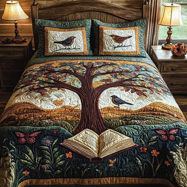 Bookish Dreams quilted 3-piece bedding set on a made bed with two matching pillow shams