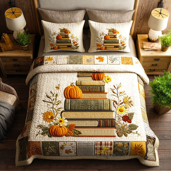 Bookish Fall quilted 3-piece bedding set on a made bed with two matching pillow shams