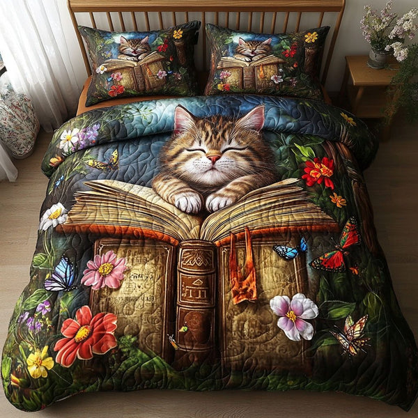 Books and Whiskers quilted 3-piece bedding set on a made bed with two matching pillow shams