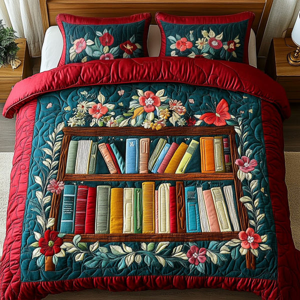 Bookworm Bliss quilted 3-piece bedding set on a made bed with two matching pillow shams