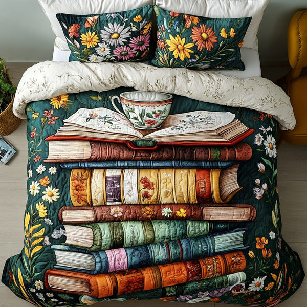 Bookworm Floral quilted 3-piece bedding set on a made bed with two matching pillow shams