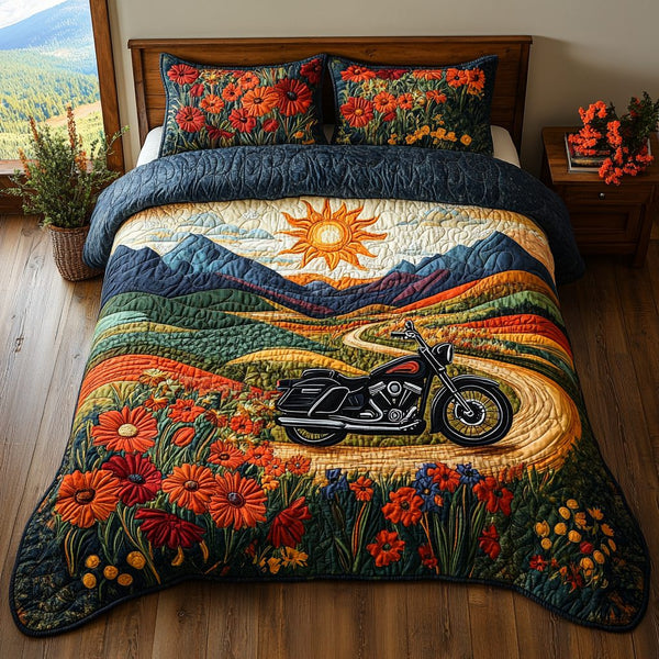 Born to Ride quilted 3-piece bedding set on a made bed with two matching pillow shams