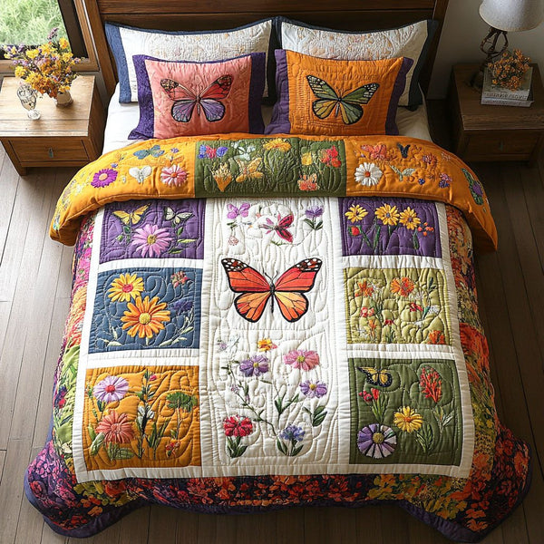 Botanical Butterfly quilted 3-piece bedding set on a made bed with two matching pillow shams