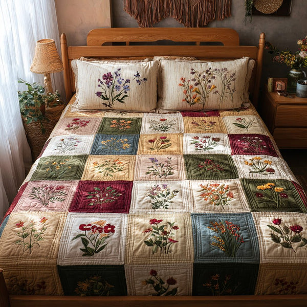 Botanical Keepsake quilted 3-piece bedding set on a made bed with two matching pillow shams