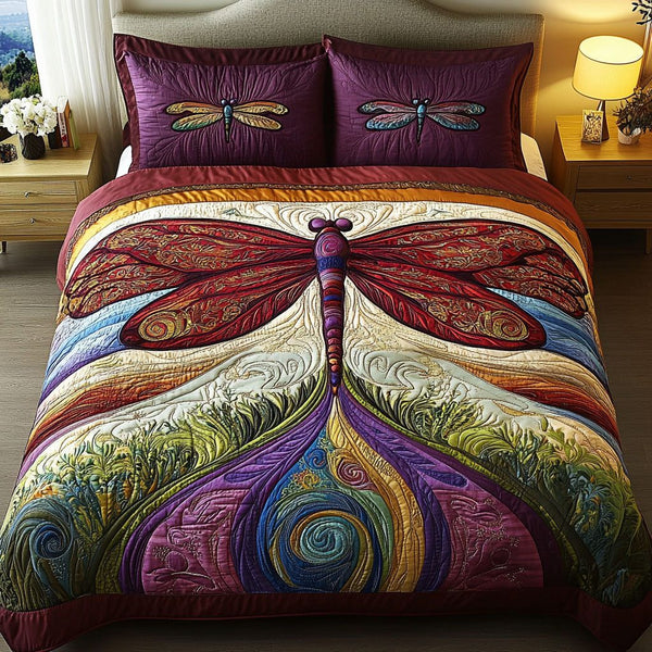 Botanical Wings quilted 3-piece bedding set on a made bed with two matching pillow shams