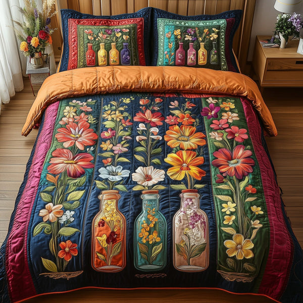 Bottle Of Blossom quilted 3-piece bedding set on a made bed with two matching pillow shams