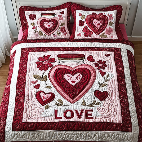 Bouquet of Hearts quilted 3-piece bedding set on a made bed with two matching pillow shams