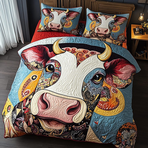 Bovine Beauty quilted 3-piece bedding set on a made bed with two matching pillow shams