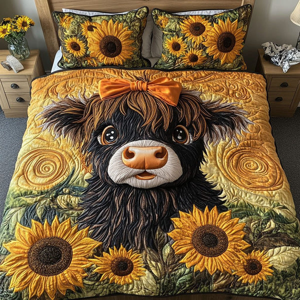 Bowtie Beauty quilted 3-piece bedding set on a made bed with two matching pillow shams