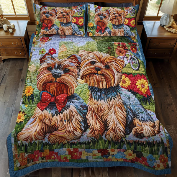 Bowtie Budies quilted 3-piece bedding set on a made bed with two matching pillow shams